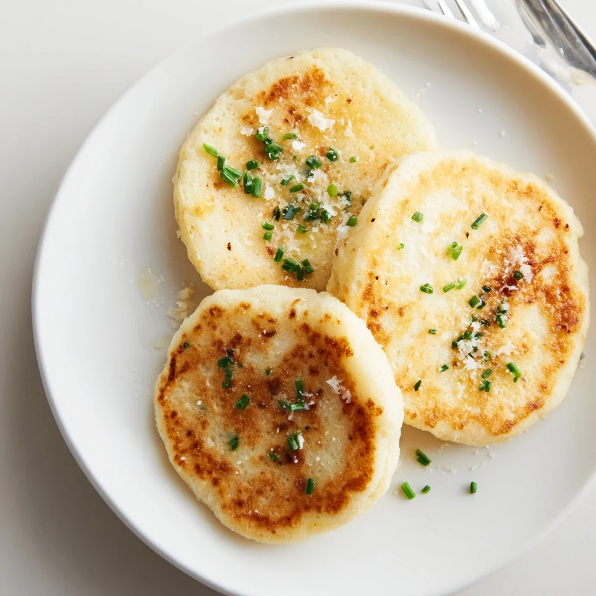 Delicate truffle oil biscuits drop scones, perfect for brunch with fresh herbs.  