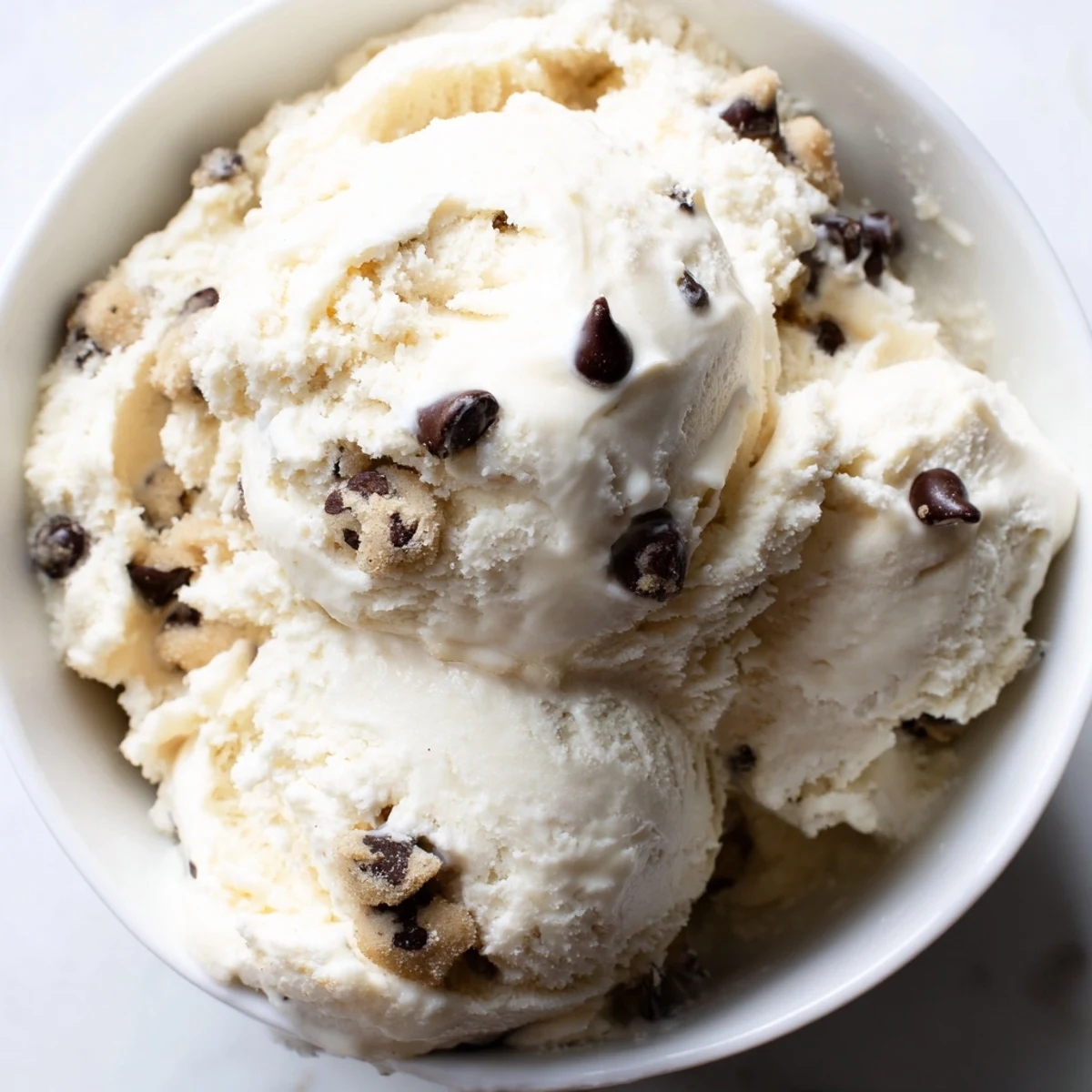 Creamy cottage cheese ice cream swirled with chewy cookie dough bites.  