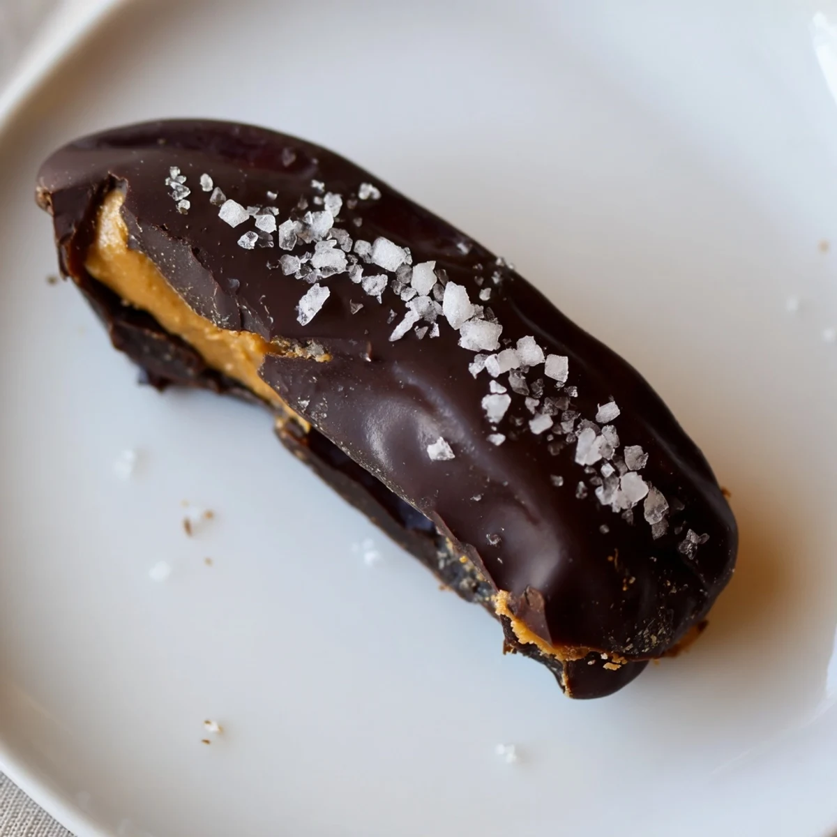 Sweet and salty chocolate peanut butter dates, showcasing the creamy peanut butter inside each date.