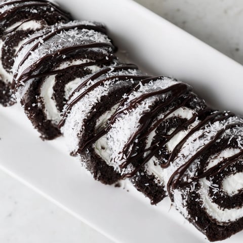 Creamy Oreo Sushi Rolls, a sweet twist; chocolate-drizzled and ready to delight.