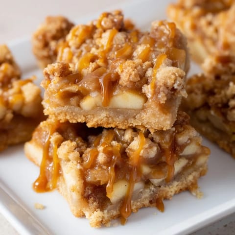 Chewy Caramel Apple Cookie Bars, loaded with sweet apples and caramel, fresh from the oven.
