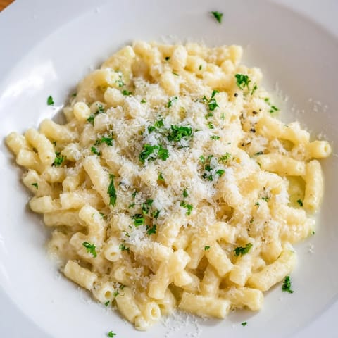 Golden, cheesy 15-Minute Garlic Parmesan Pasta, perfectly cooked and coated in rich, flavorful sauce.