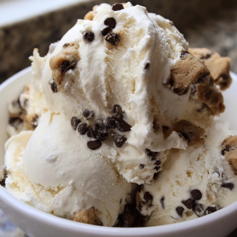 Refreshing cottage cheese ice cream, showcasing delightful bursts of chocolate chip cookie dough.